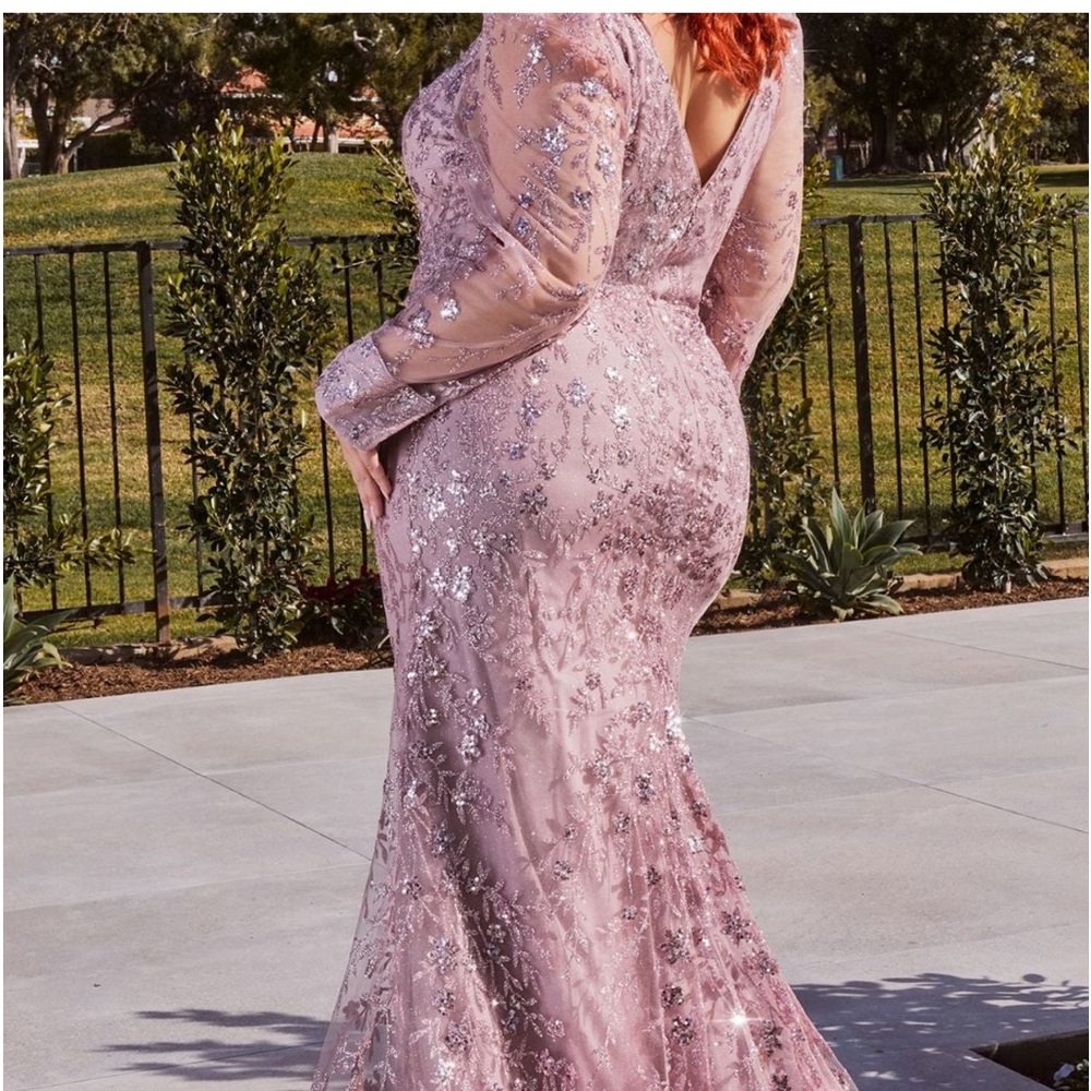 Dress is beautiful new with tags a 10 runs small it fits like 6-8